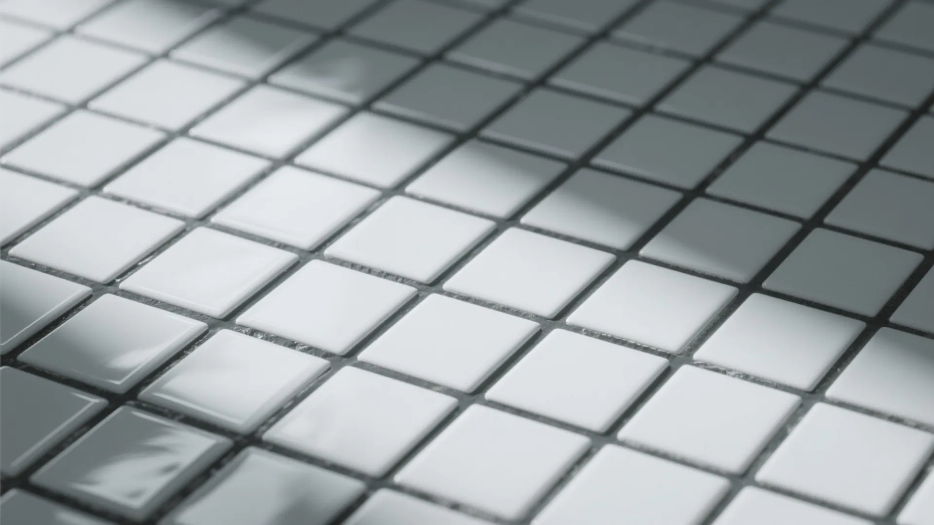 Close up view of small square white wall tiles with soft natural light and shadows