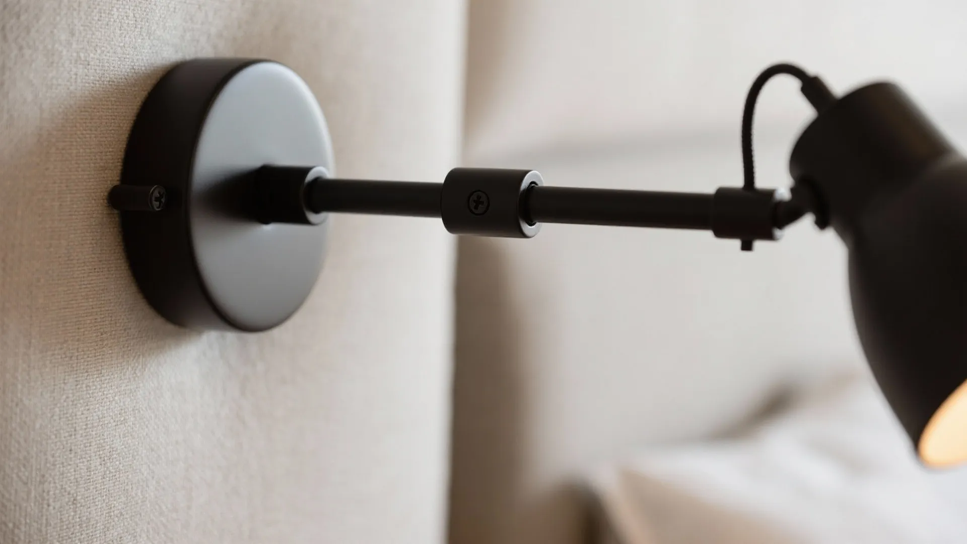 Minimalist swing-arm sconces for flexible focus