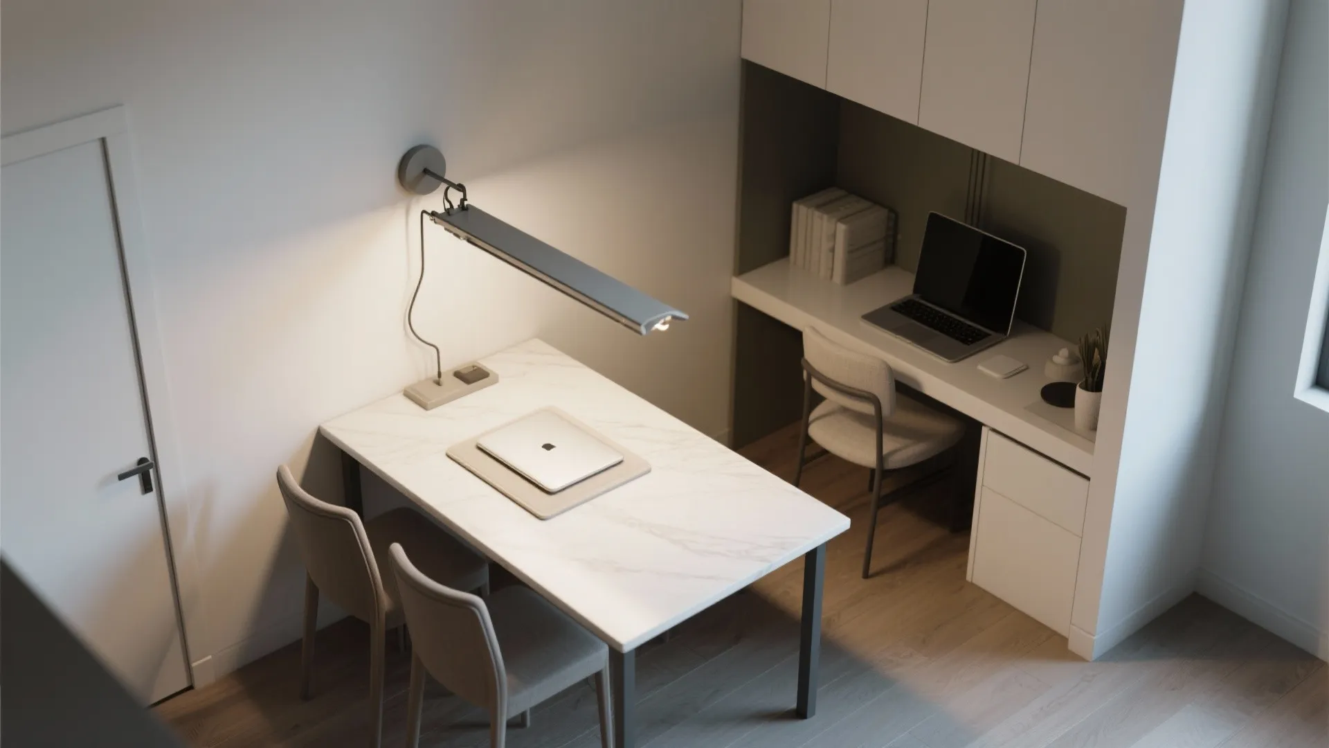 Modern home office area featuring a marble desk with two chairs and a wall light