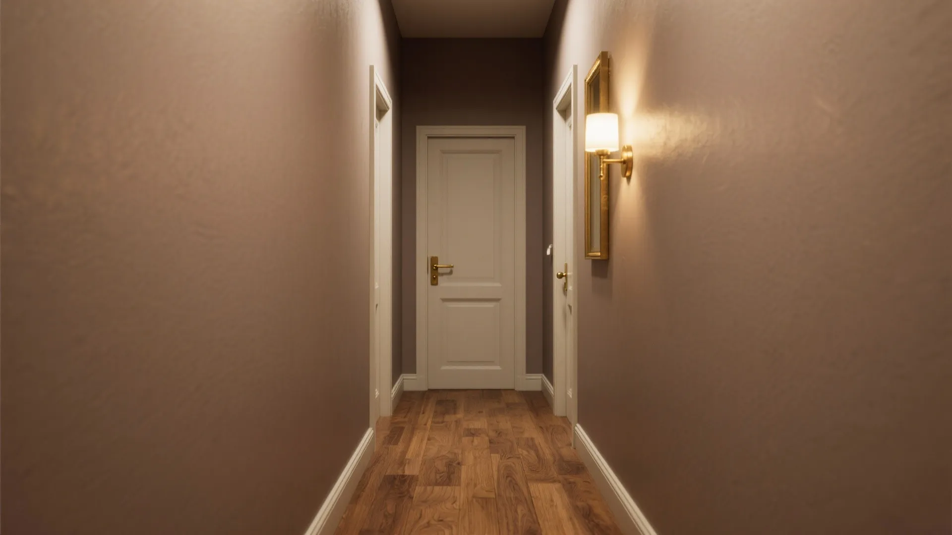 Narrow hallway with warm taupe walls, medium oak flooring and brass hardware creating a cohesive look.