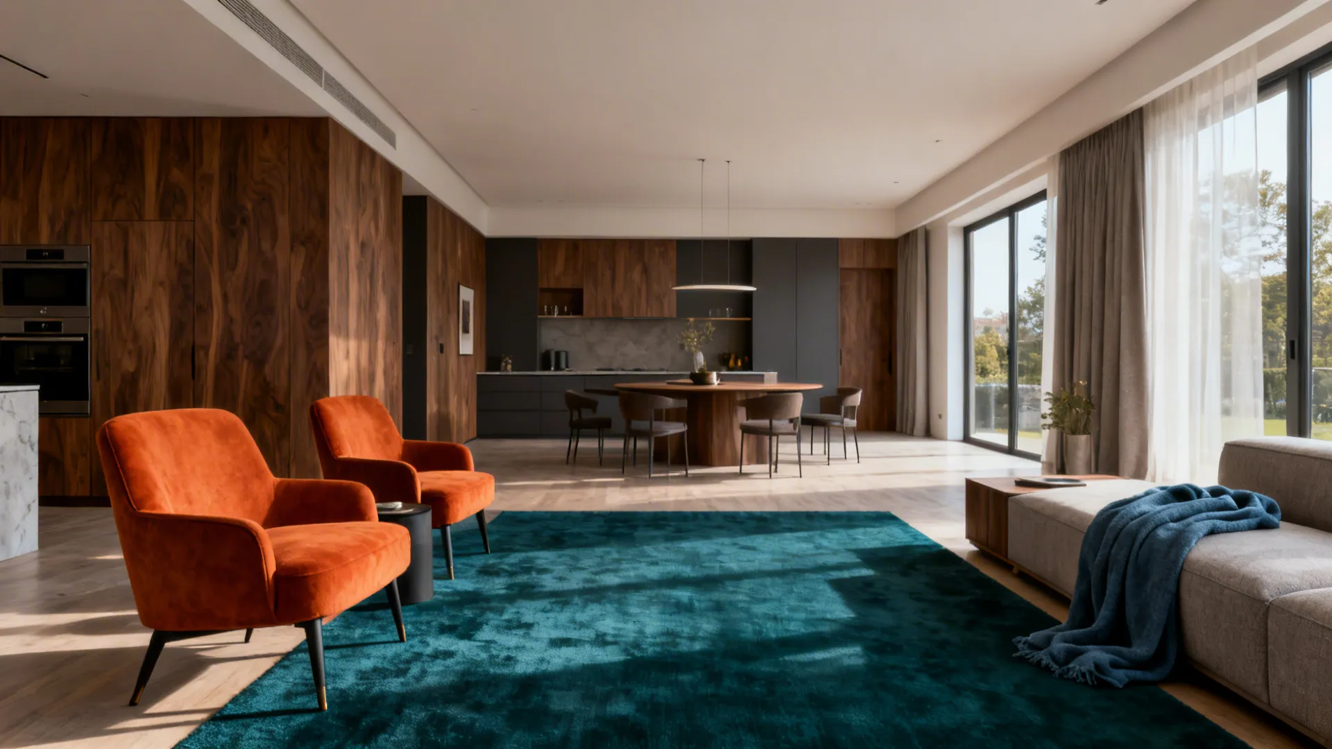 Burnt orange chairs paired with a deep teal rug and slate-blue throws in an open-plan living area.