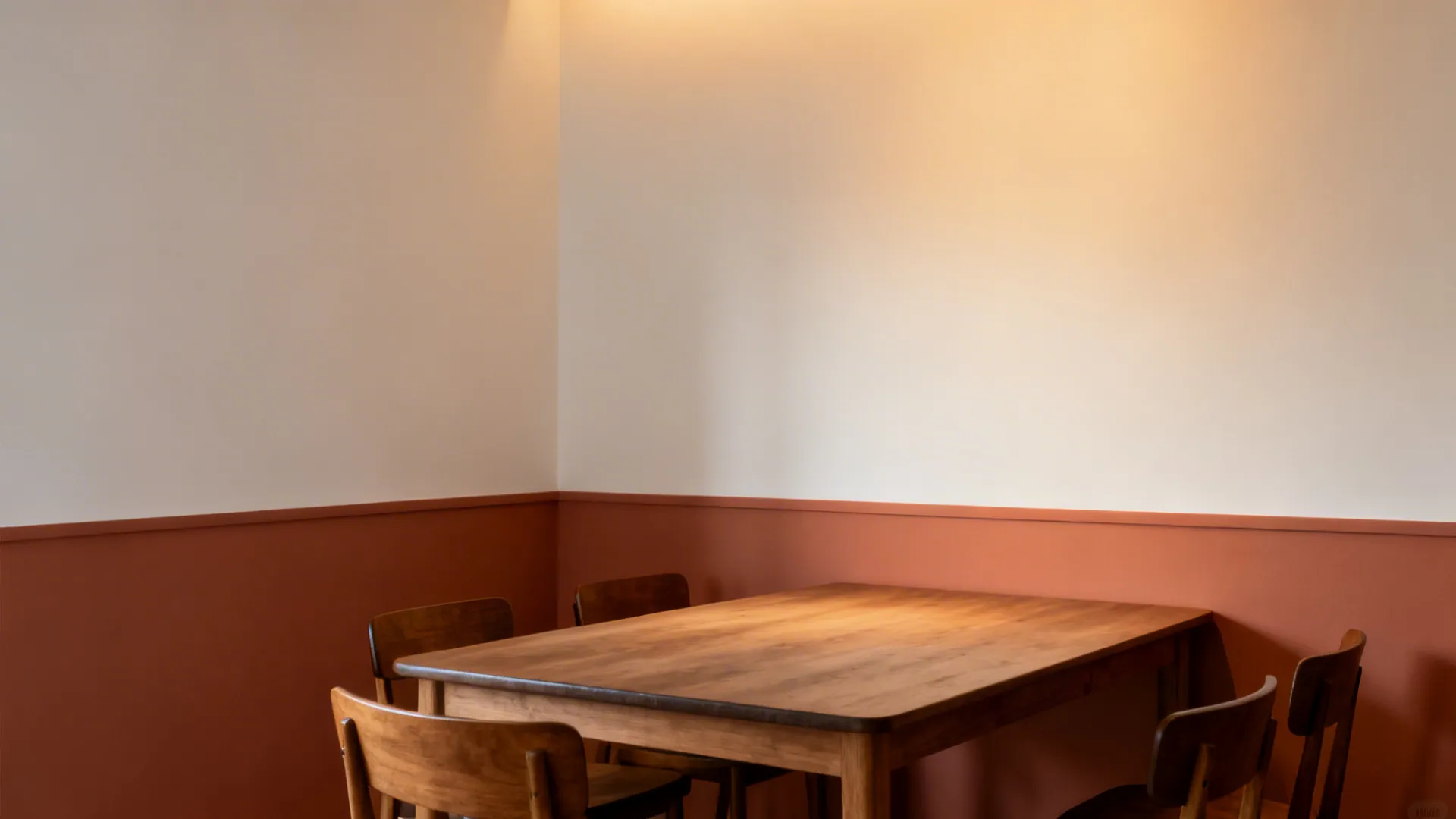Before-white dining corner versus after with terracotta band and warm lighting.