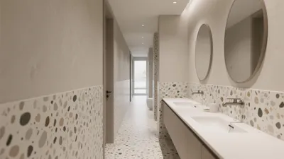 Modern Bathroom with Terrazzo Tiles and Round Mirrors