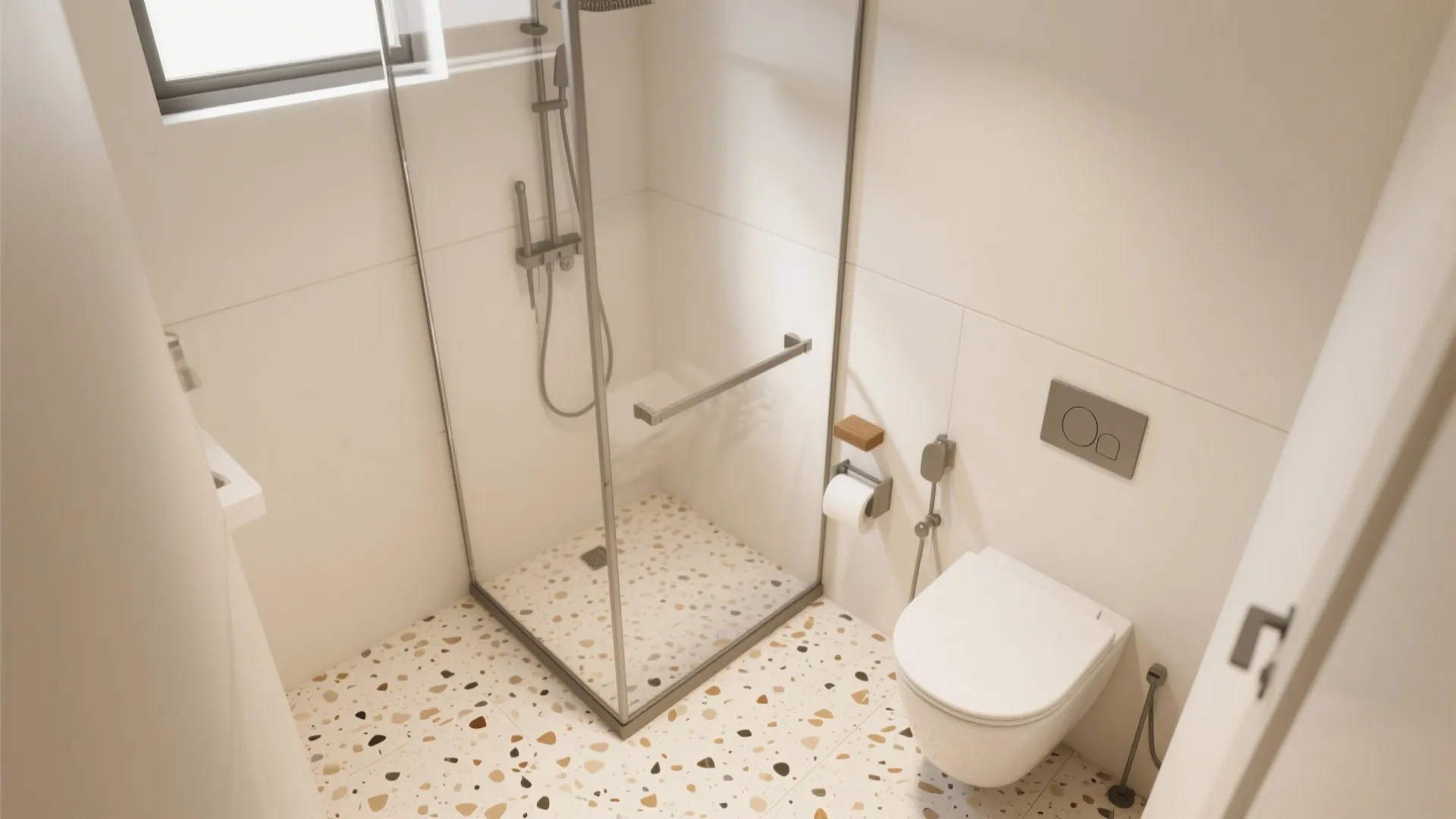 Minimalist bathroom design with patterned floor tiles glass shower toilet and clean white wall panels