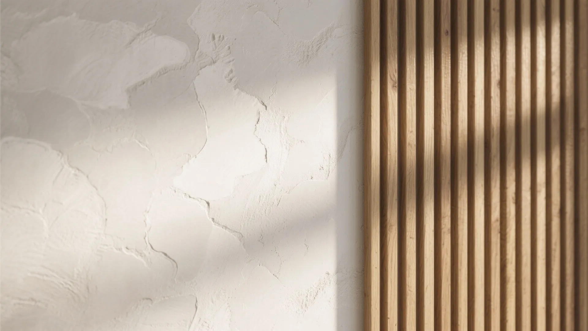Texture that earns its keep: limewash, microcement, and subtle slats