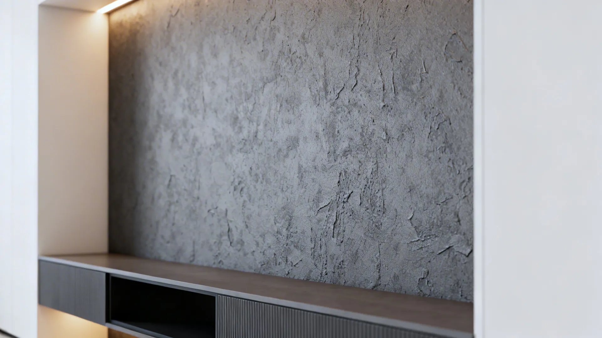 Textured plaster gray accent wall behind a media console with warm lighting.
