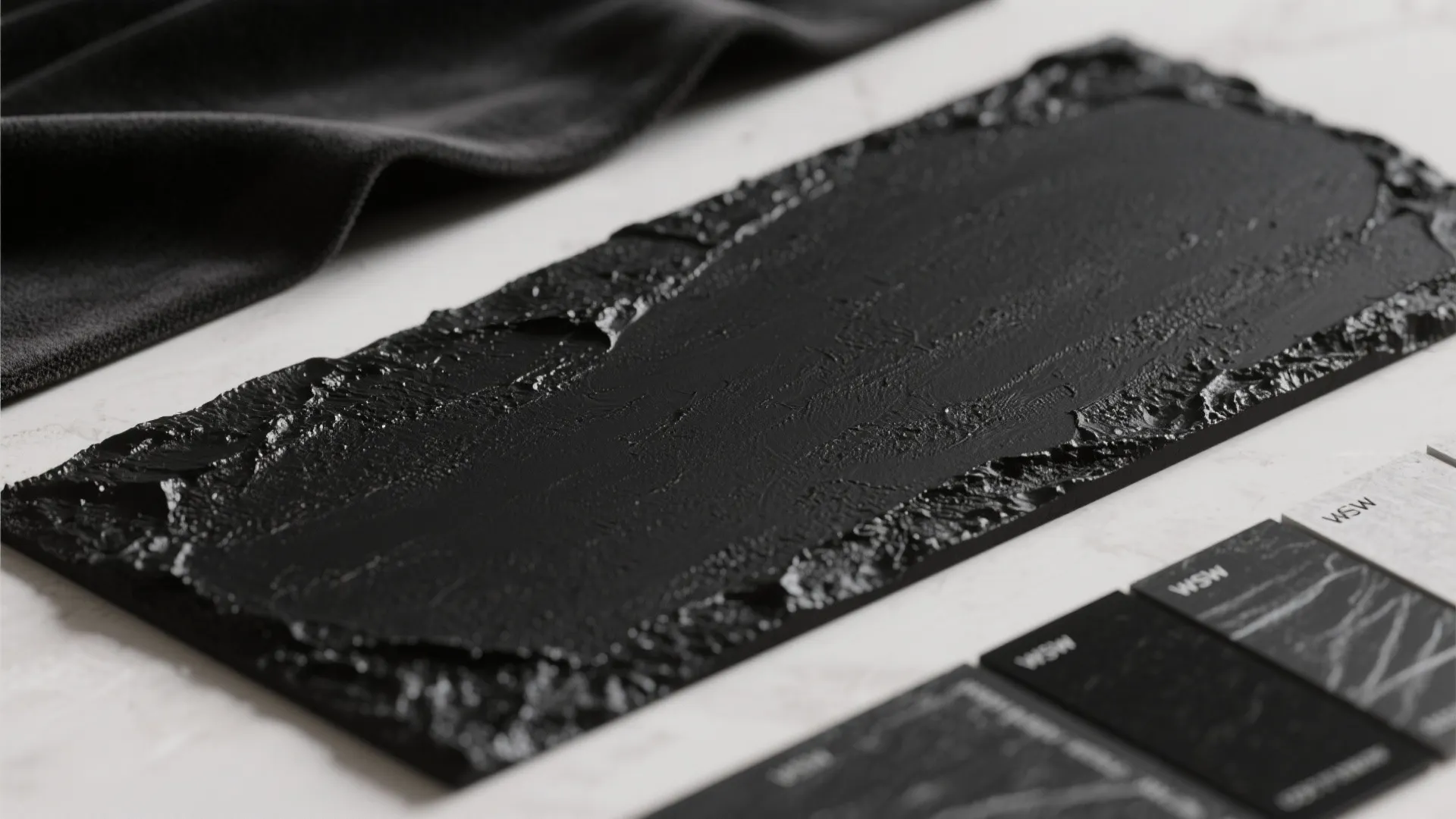 5. Textured black finishes: plaster, chalkboard paint, or fabric panels