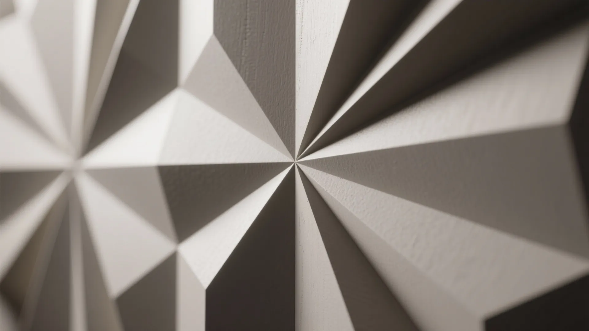 Macro view of 3D geometric MDF half panels showing sculptural texture.