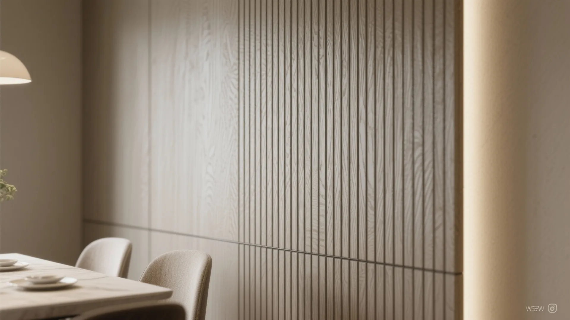 Close up of vertical wooden wall panel design in a dining room with light and table
