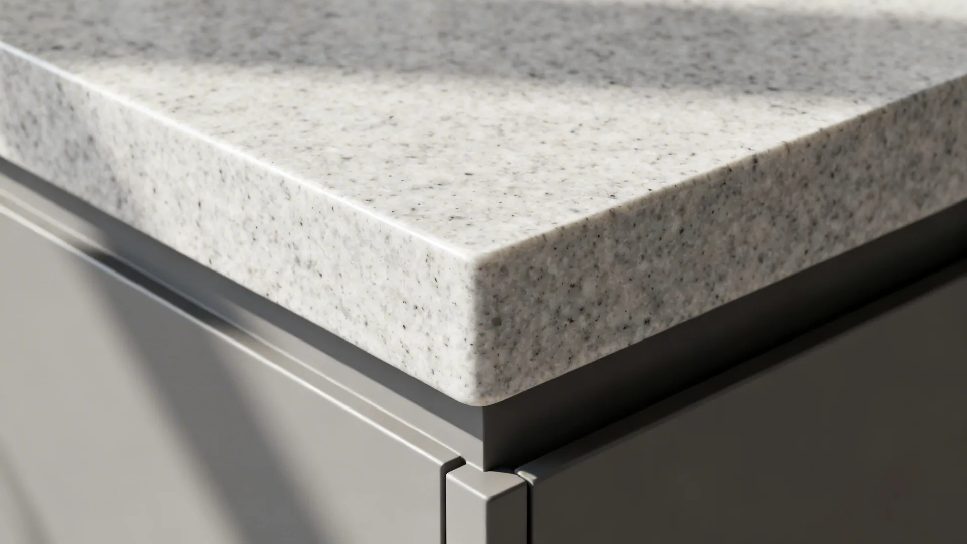 Macro of a quartz mitered front edge creating a thick look with a smooth underside round-over.