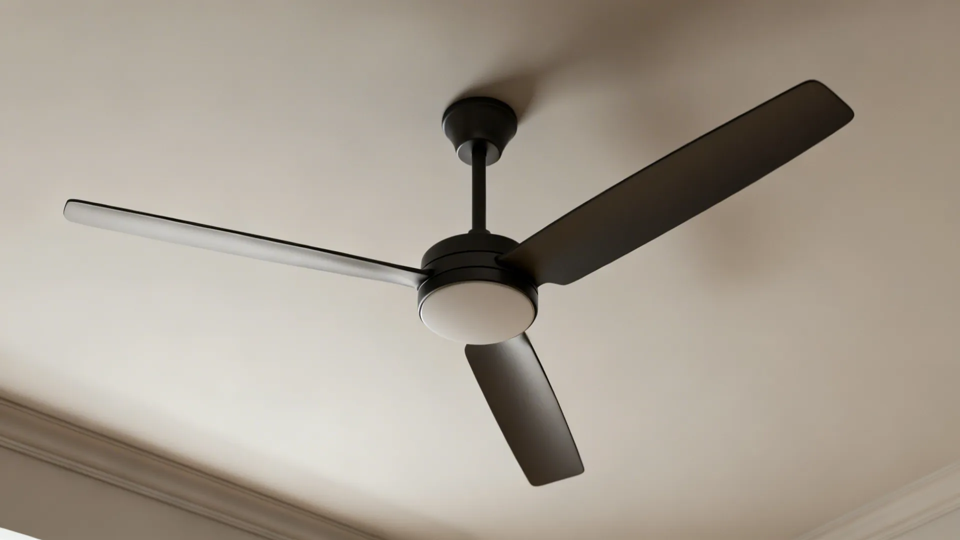 Minimal three-blade ceiling fan hub with aerodynamic blades in matte finish