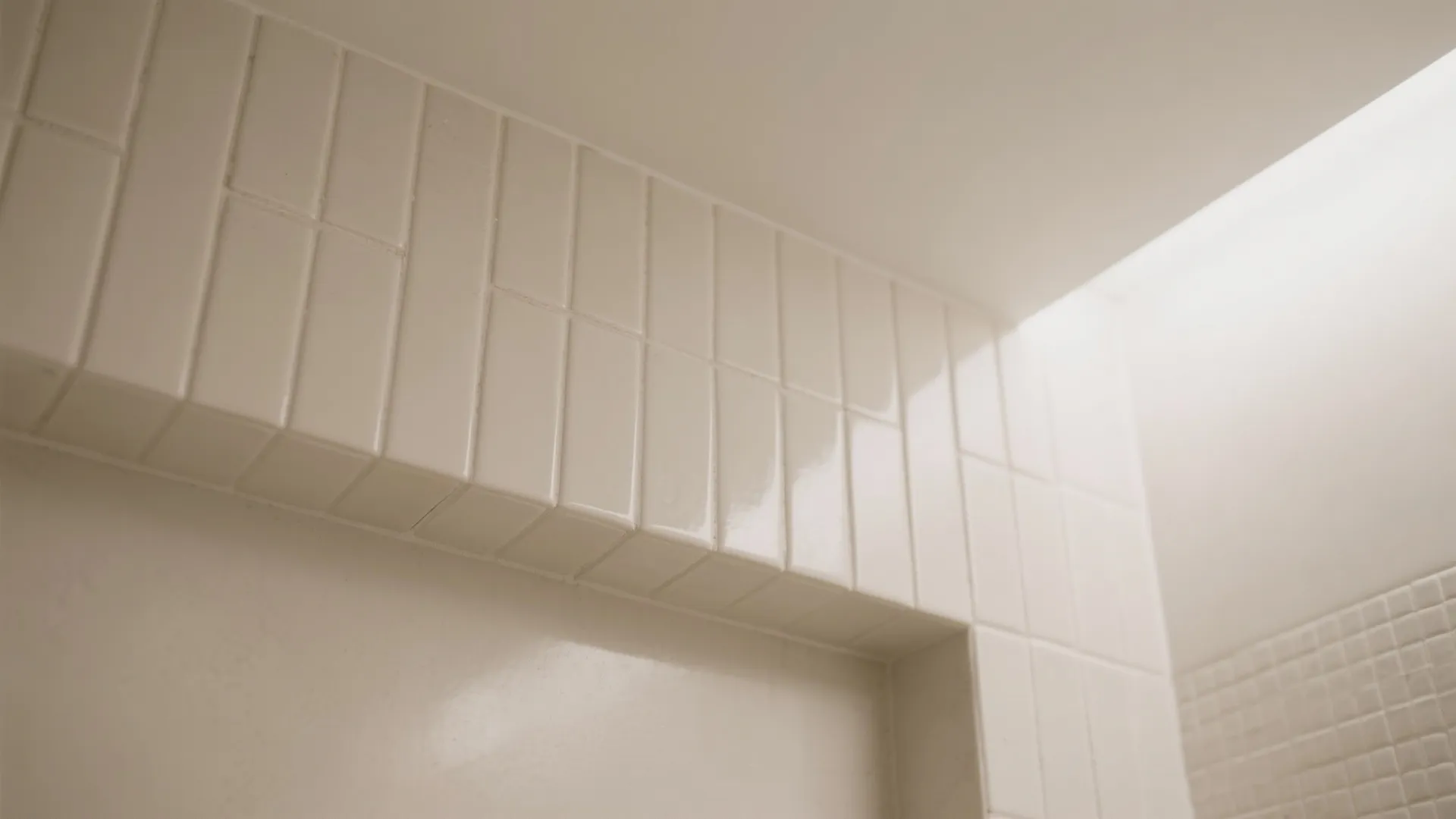 Tile to ceiling and a restrained palette