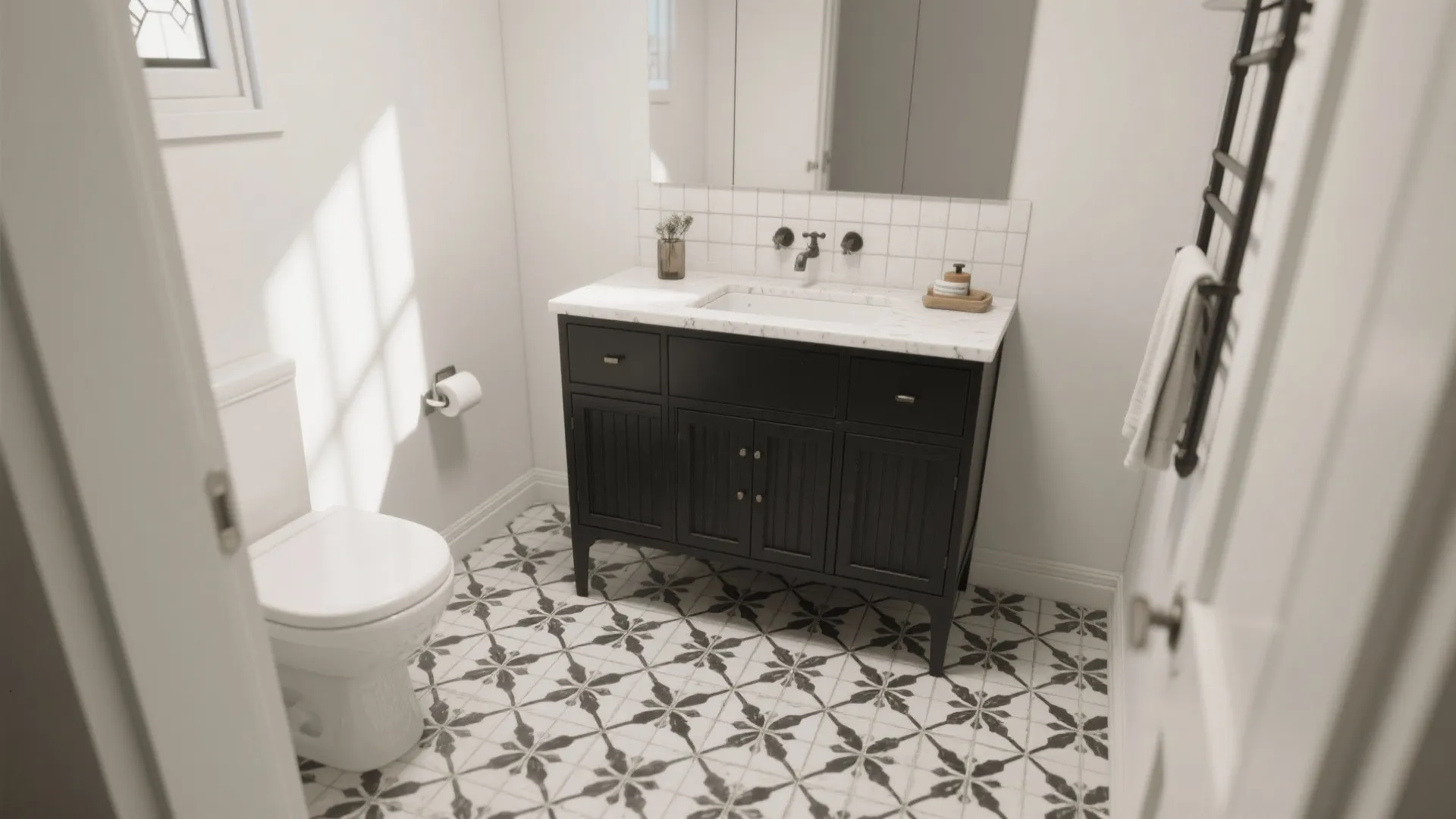 Bright bathroom with floral floor tiles black wood cabinet white marble counter toilet and wall mirror