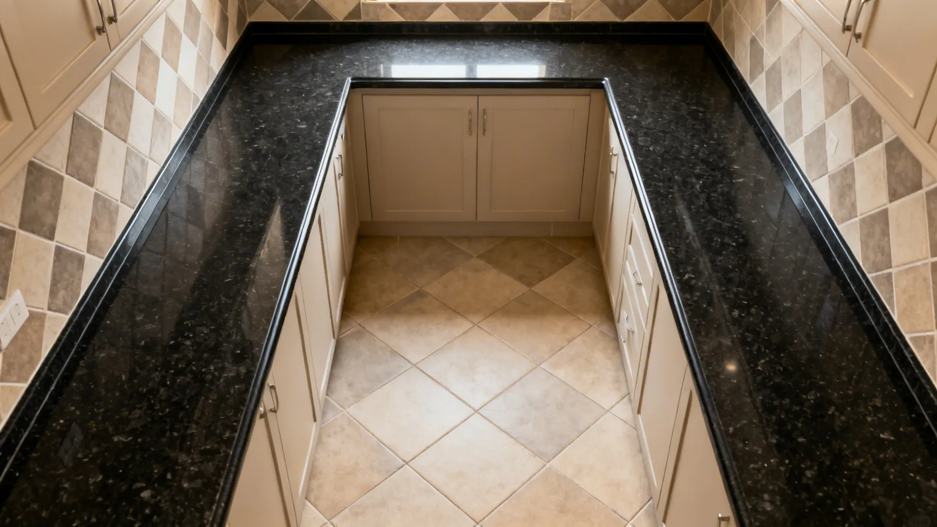 Top-down view comparing diagonal and straight tile layouts with black granite counters.