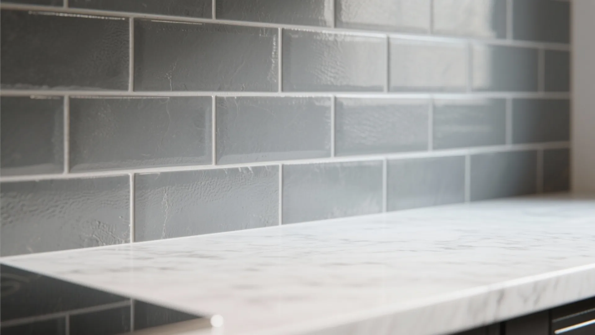 3. Grey Subway Tile Backsplash with White Quartz Countertops