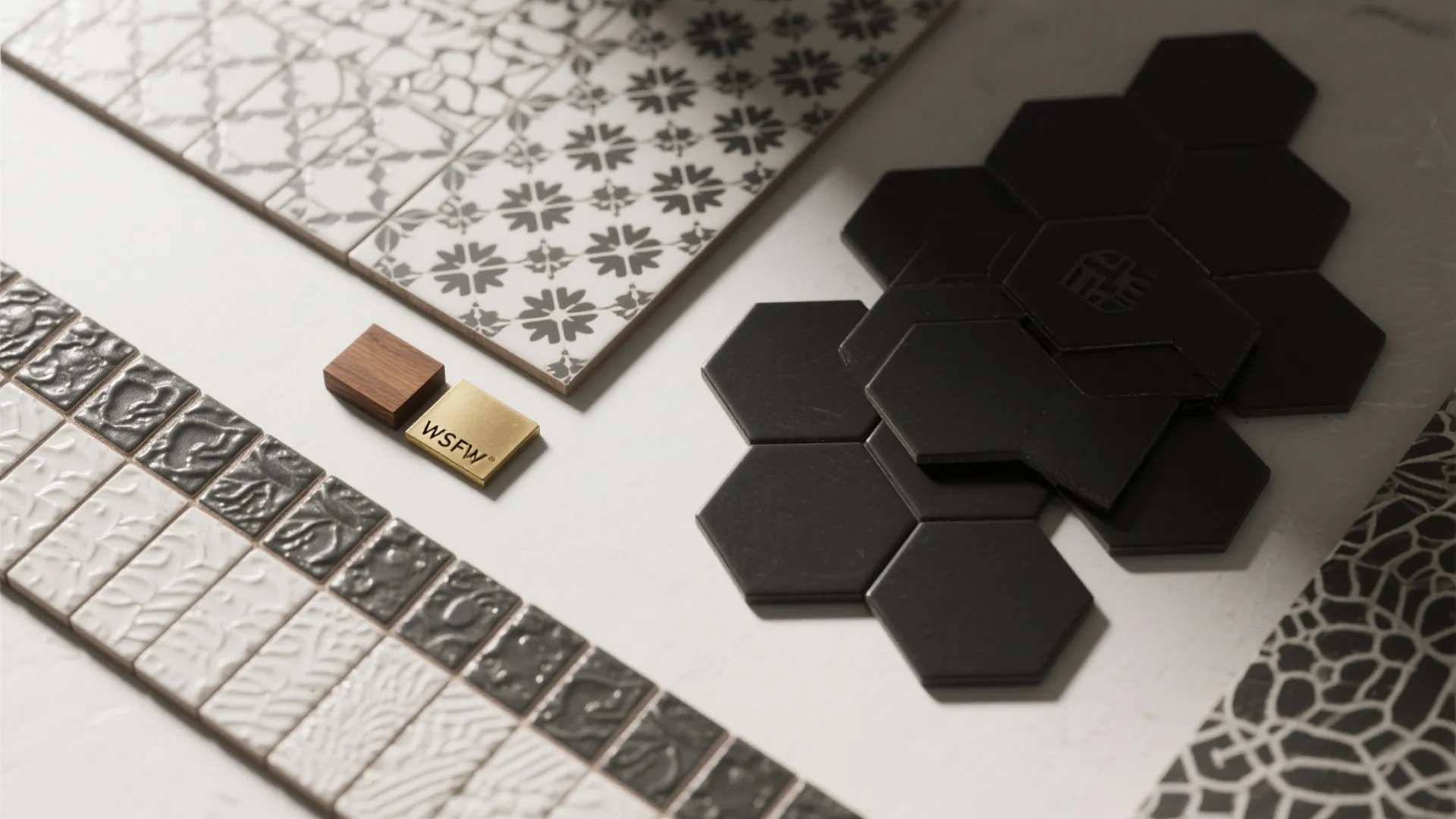 3. Mix matte black hexagon with patterned or textured tiles
