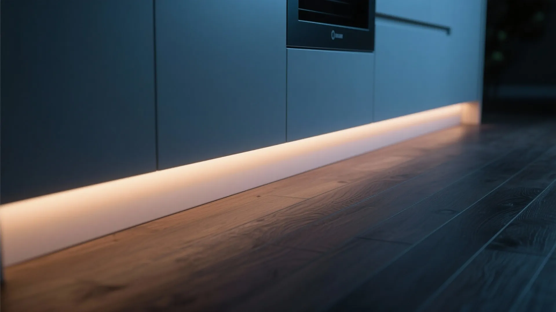 Warm LED toe-kick lighting at base of kitchen cabinets