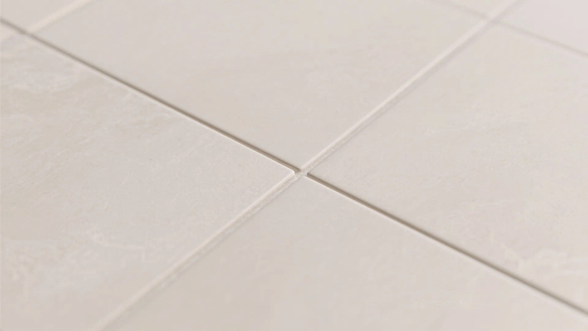 Color-matched grout and rectified edges for a seamless look
