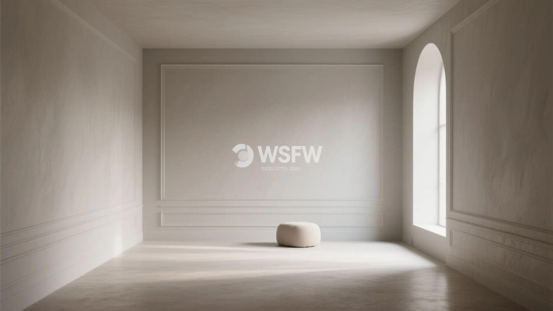 Minimalist cream colored room with wall panel arch window soft natural light and a small footrest