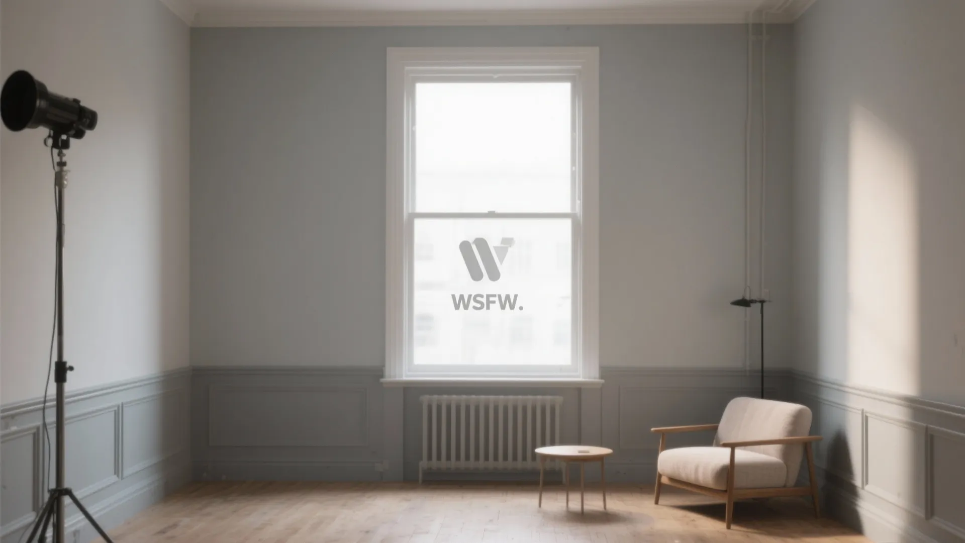 Small studio room showing subtle tone-on-tone trim slightly lighter than the wall for a calm look.