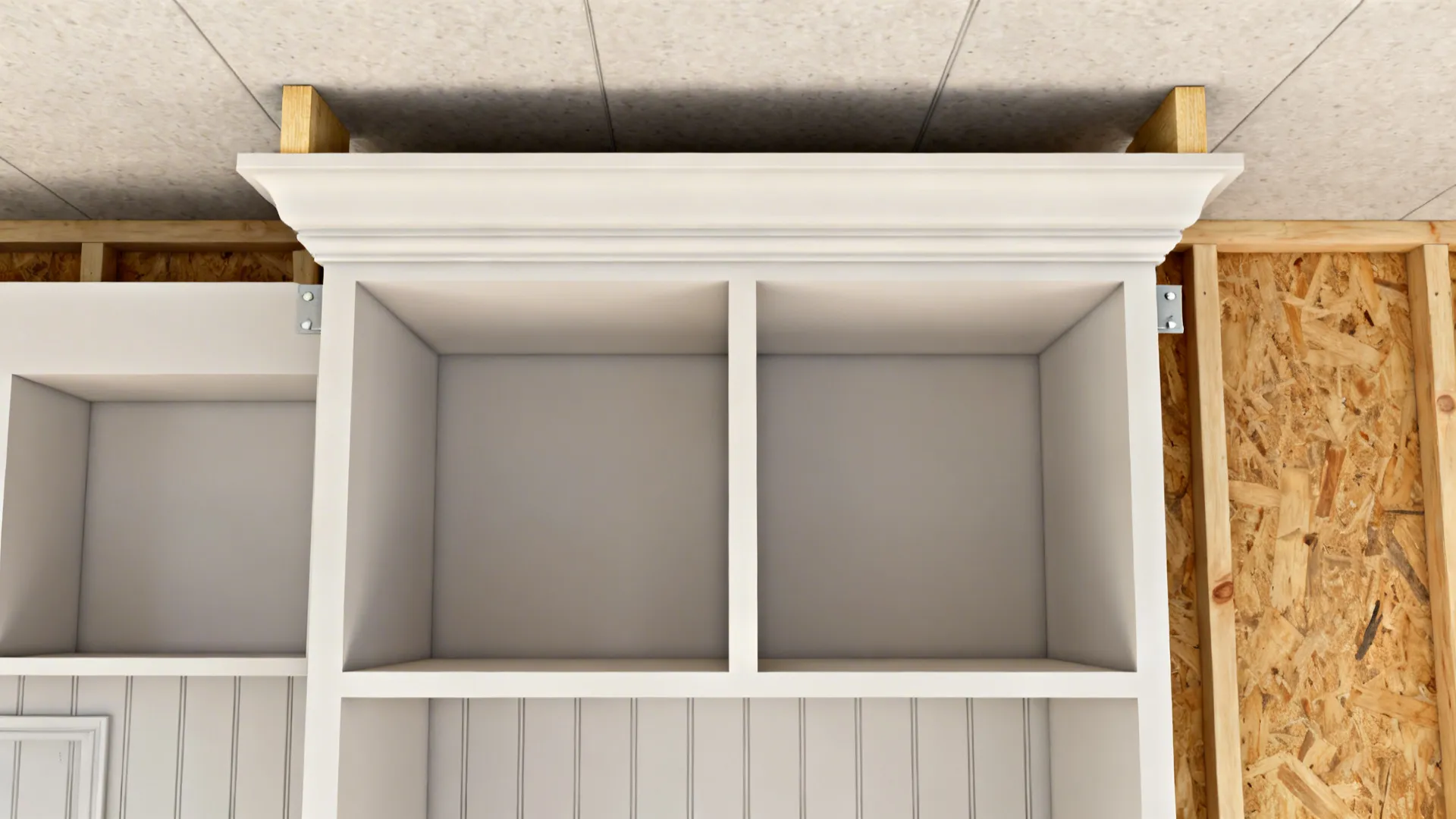 Top-down view illustrating a shallow topper above cabinets with a crown front and cleats for fastening.