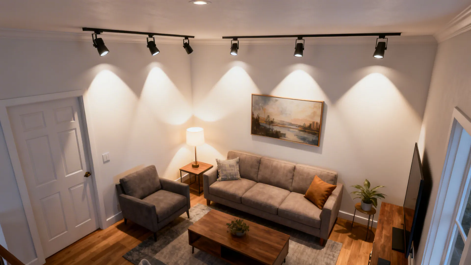 Top-down plan showing recessed track positions, aiming angles, and living room layout.