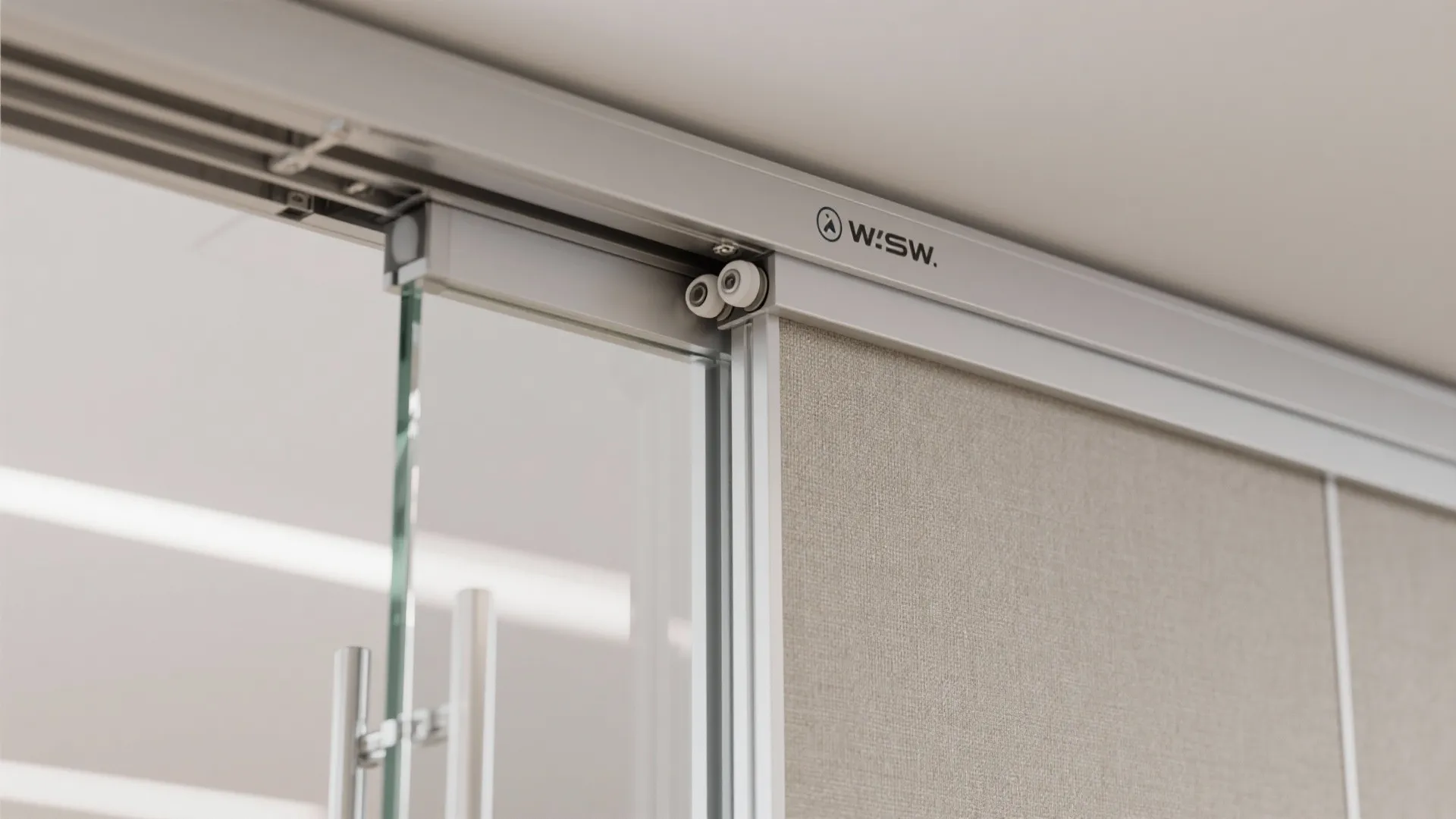 Macro detail of ceiling-mounted double-track hardware with translucent and fabric panels in soft daylight.