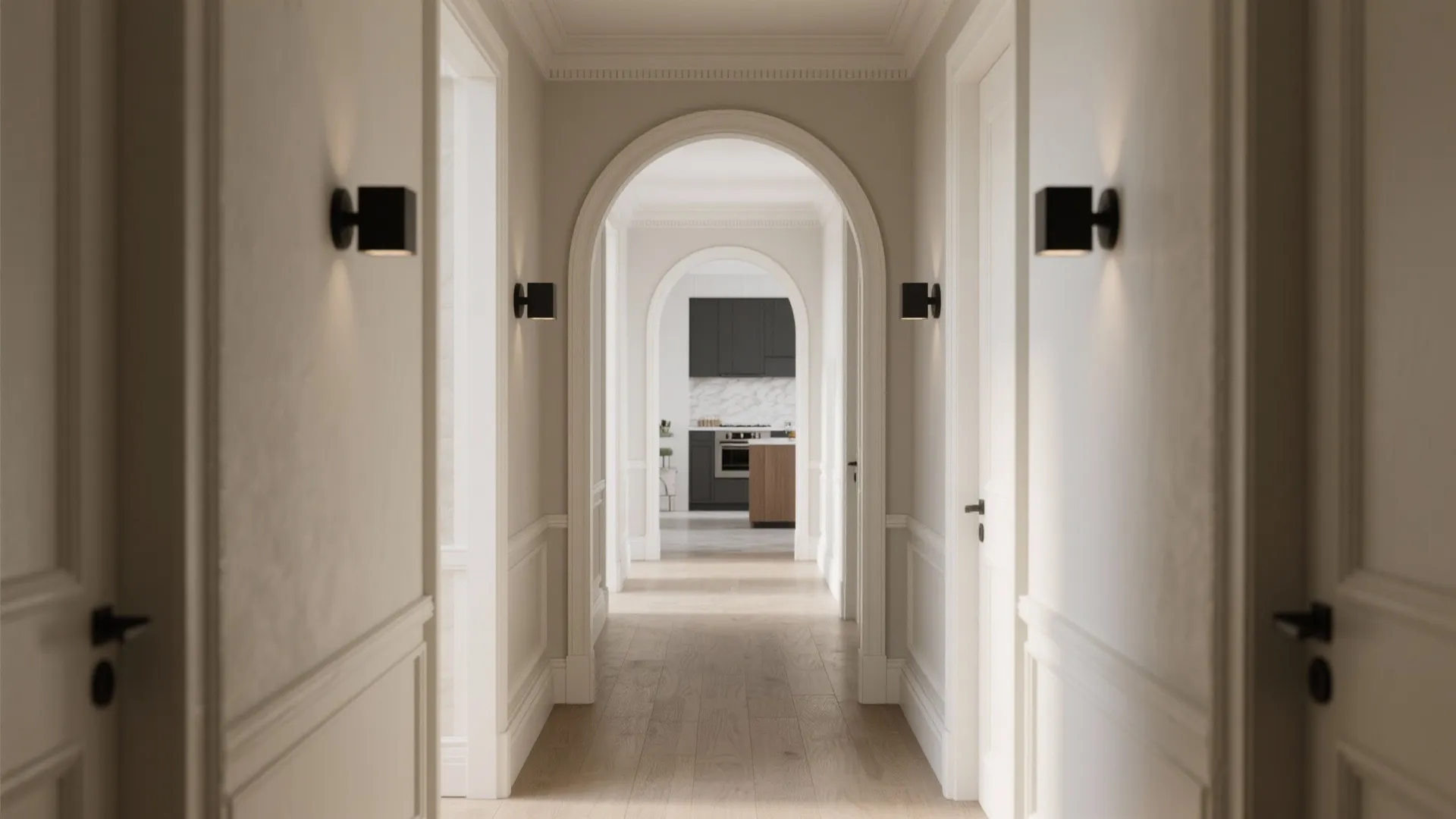 Long white hallway with arched doorways leading to a modern kitchen with black cabinet design