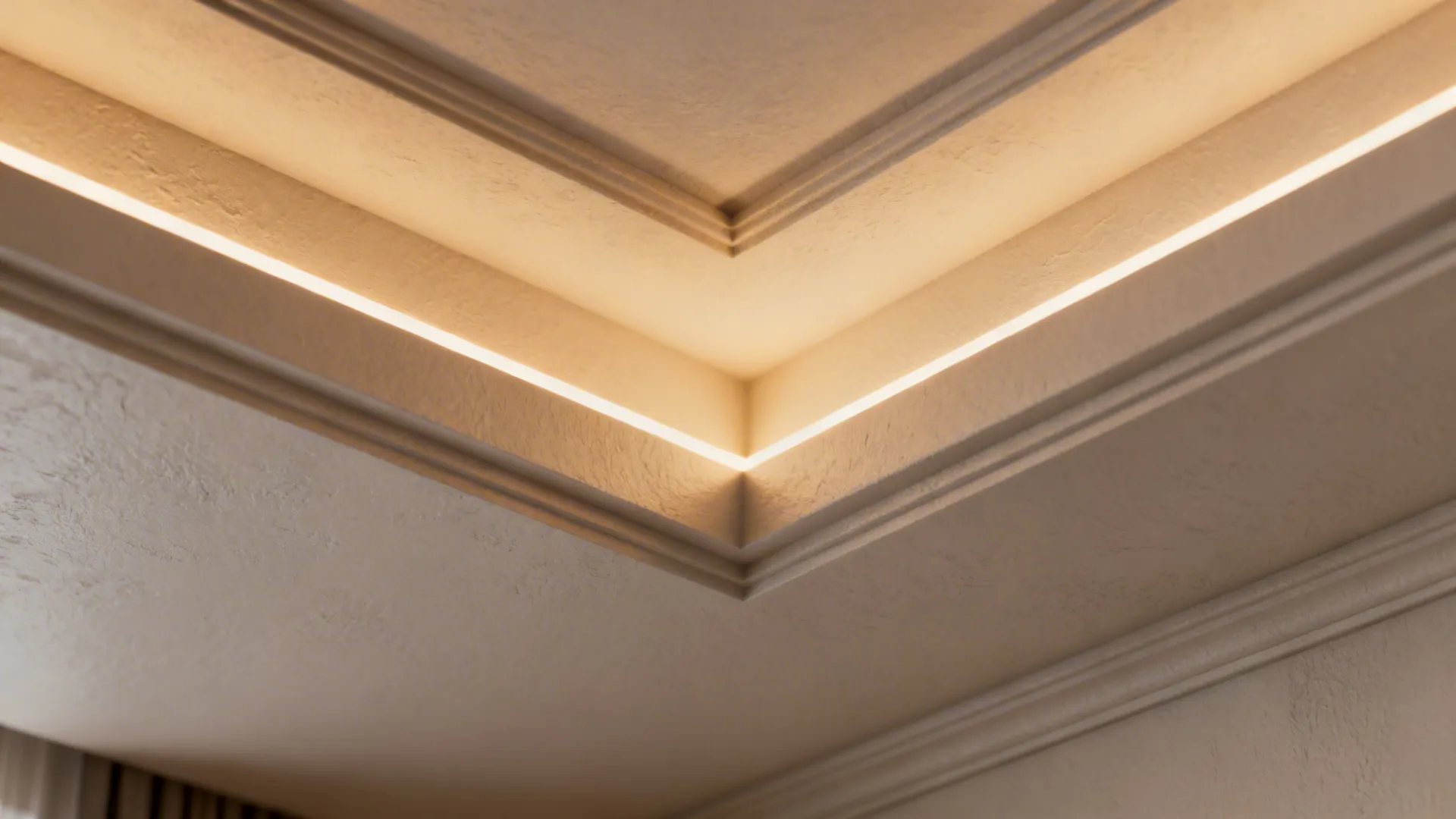Close-up of layered tray POP ceiling with hidden cove LED lighting.