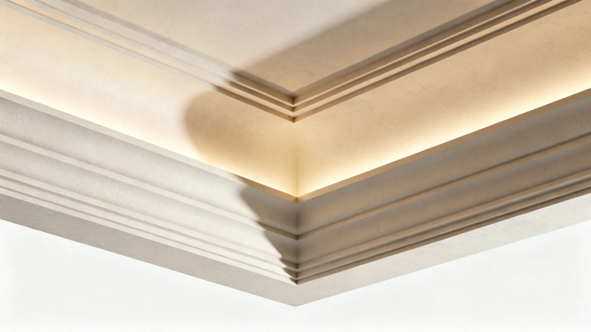 Close-up of a POP tray ceiling corner showing a smooth radiused curve and soft light.