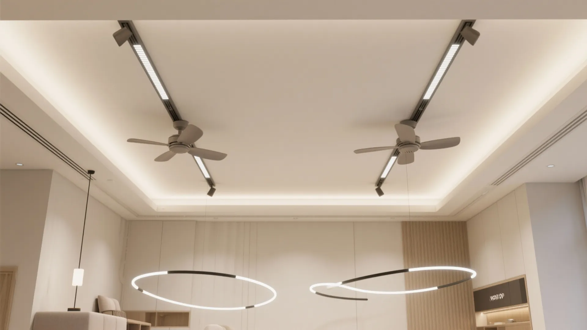 Modern white ceiling with two ceiling fans, track lighting, and two large ring ceiling lights