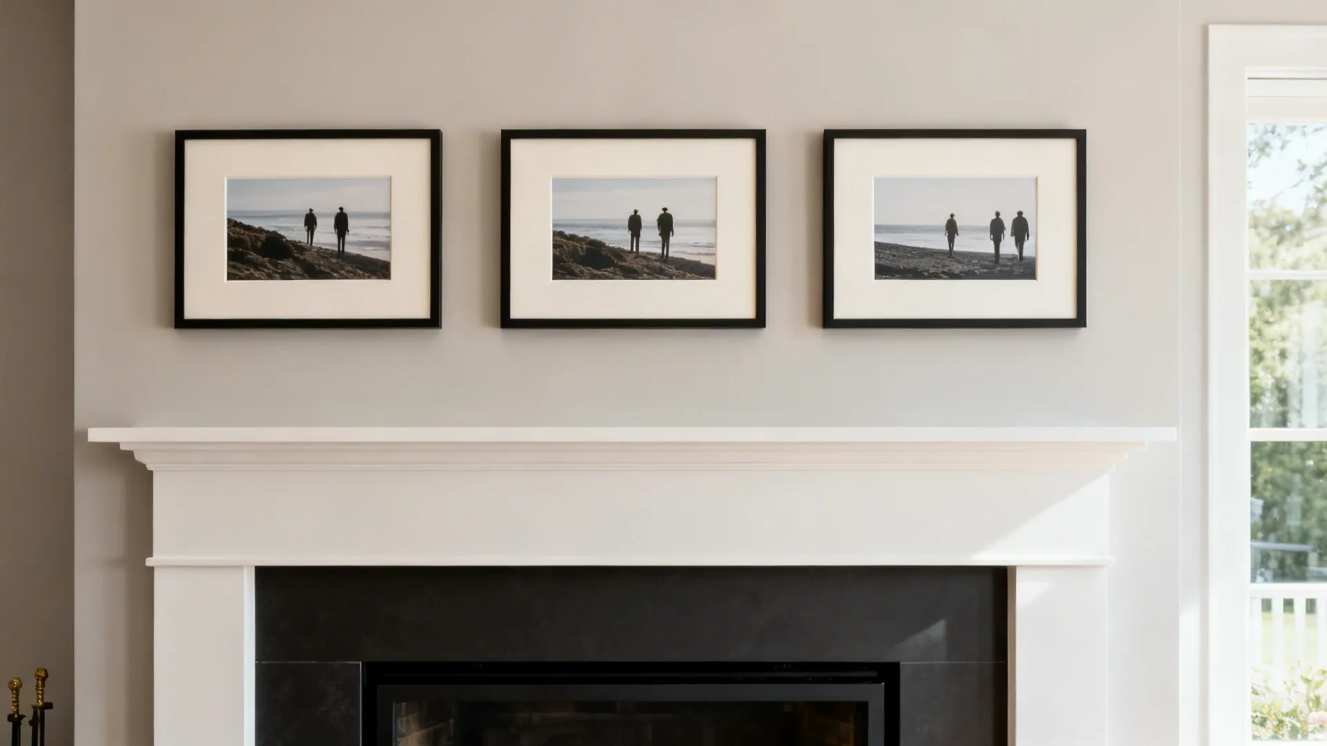Coordinated triptych of photographic prints above a mantel, evenly spaced and modern.