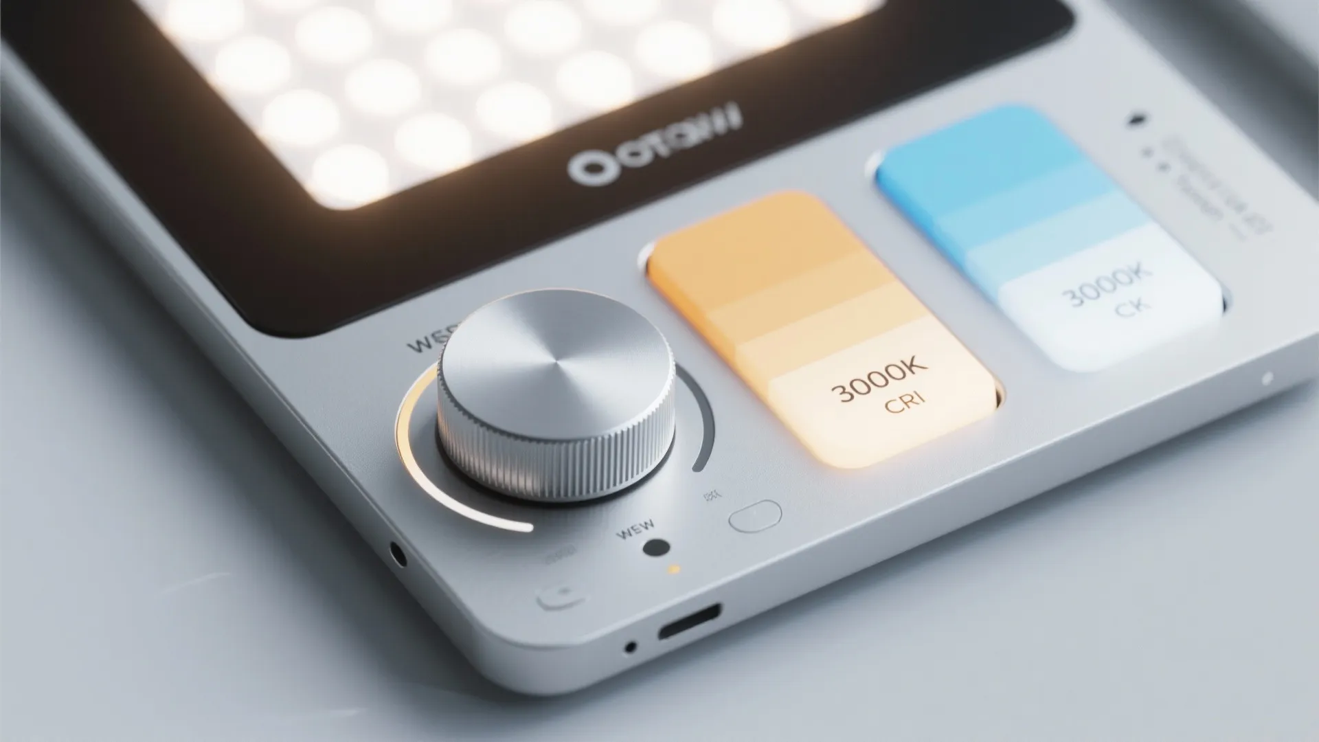 Macro of tunable white LED fixture and control showing warm and cool color temperatures.