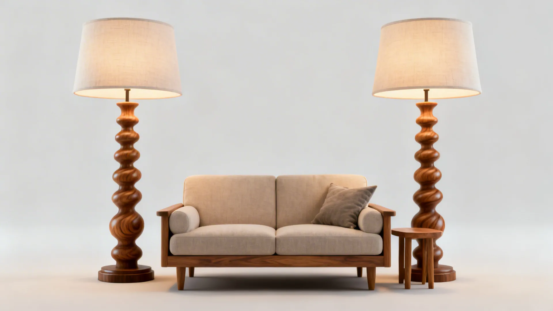 Beige sofa with wooden frame and two tall carved wood floor lamps on white background