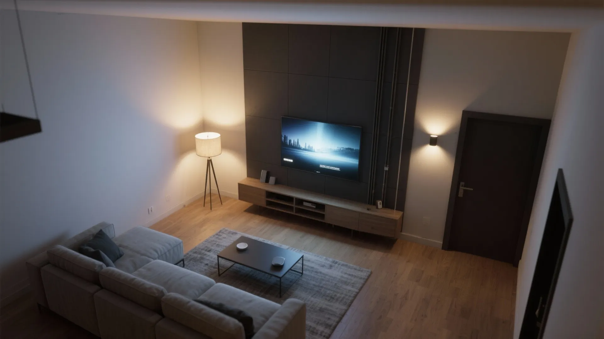 Living room layout showing grey sofa wooden floor coffee table and television on dark wall