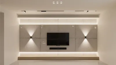 Modern Concrete TV Wall with Layered Lighting Design