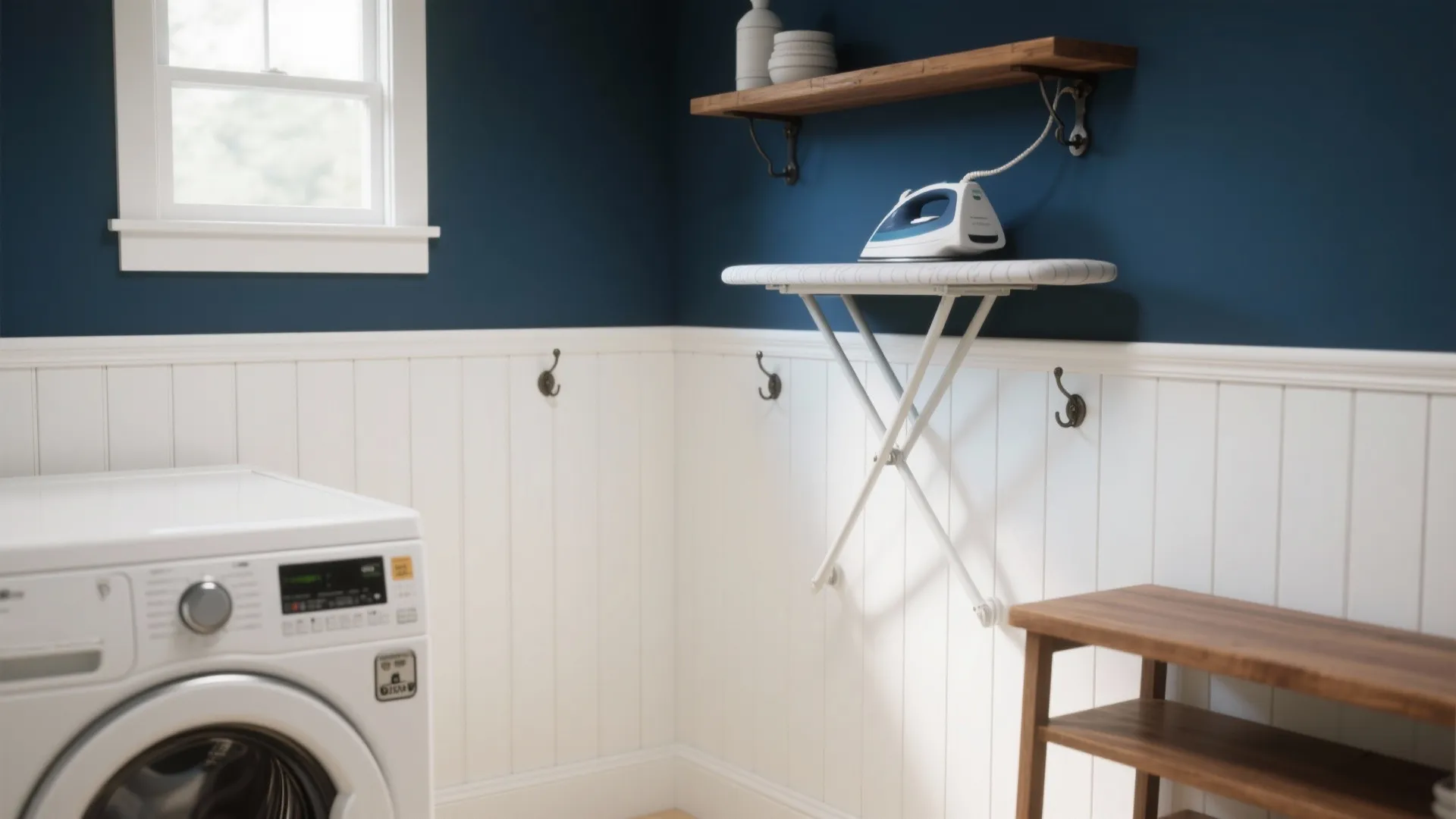 Laundry room corner featuring navy blue walls white wall panels ironing board and washing machine