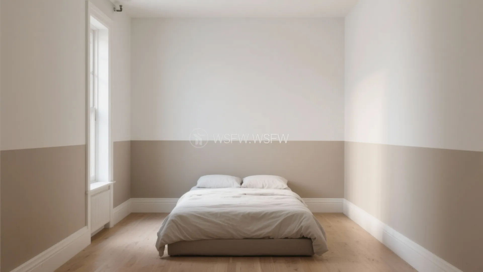 Simple bedroom with white bed and two tone wall paint in beige and white colors
