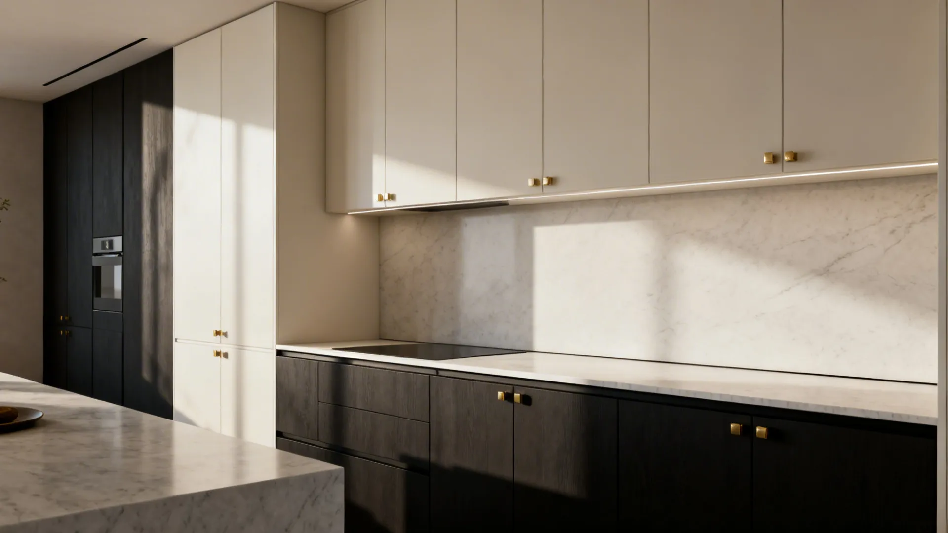 Two-tone kitchen cabinets with darker lowers and light uppers creating visual depth