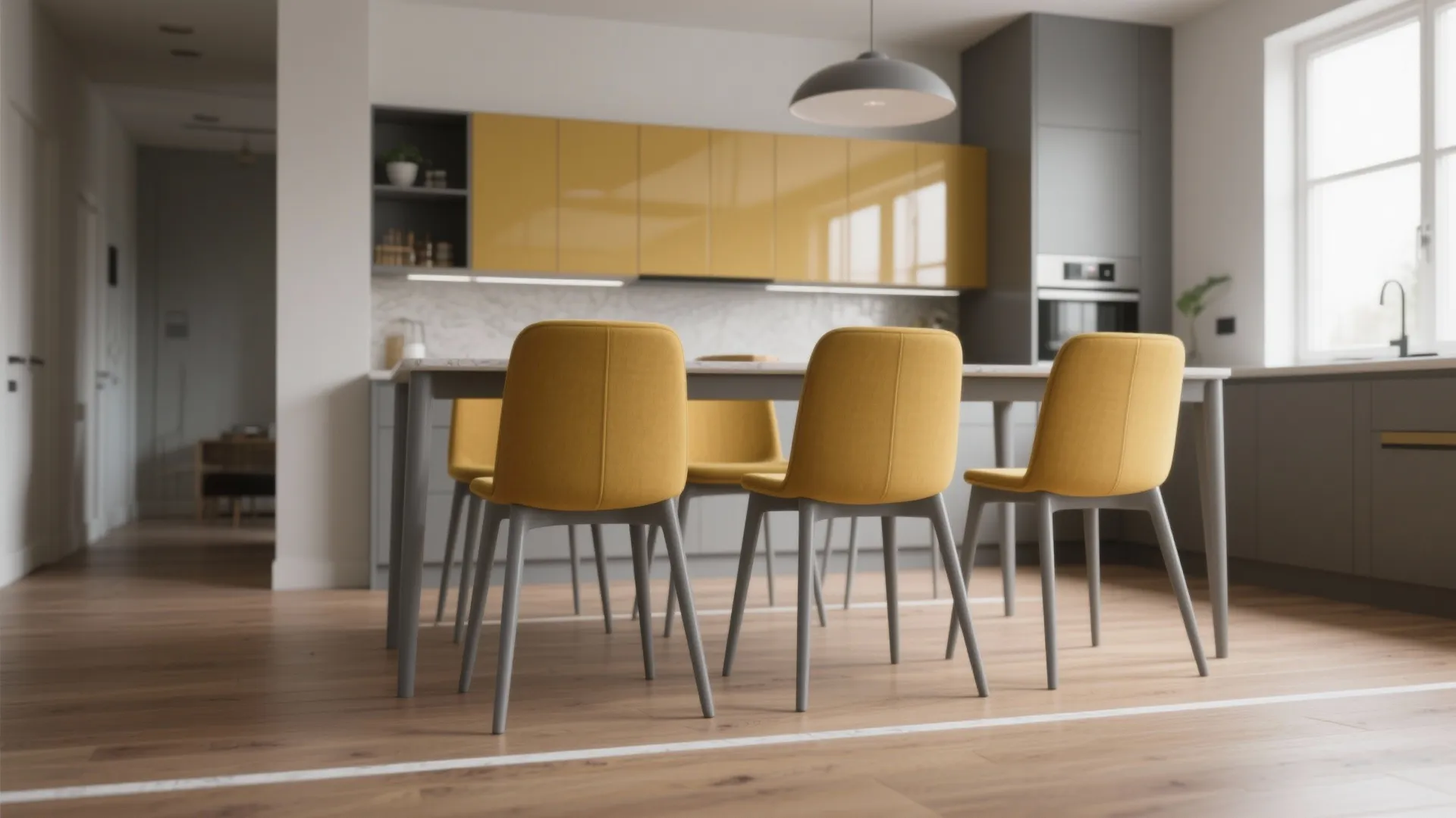 Modern kitchen with yellow chairs around a grey table and matching yellow and grey cabinets