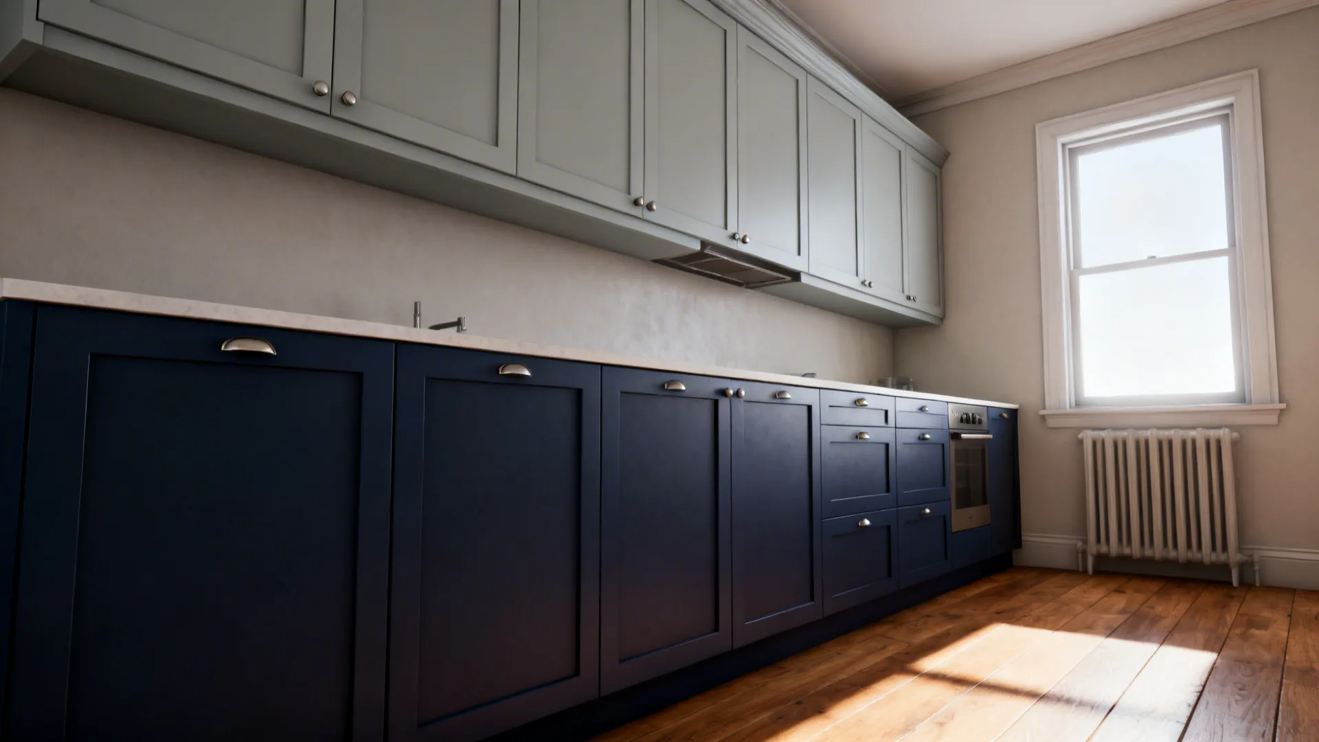 Narrow kitchen with navy lower cabinets and pale gray uppers creating visual depth