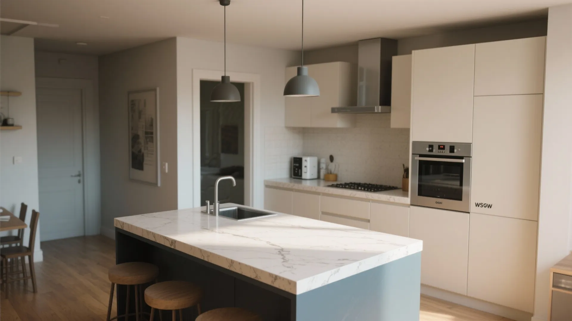 Open-plan kitchen countertop with light surface and contrasting dark painted edge defining the work zone