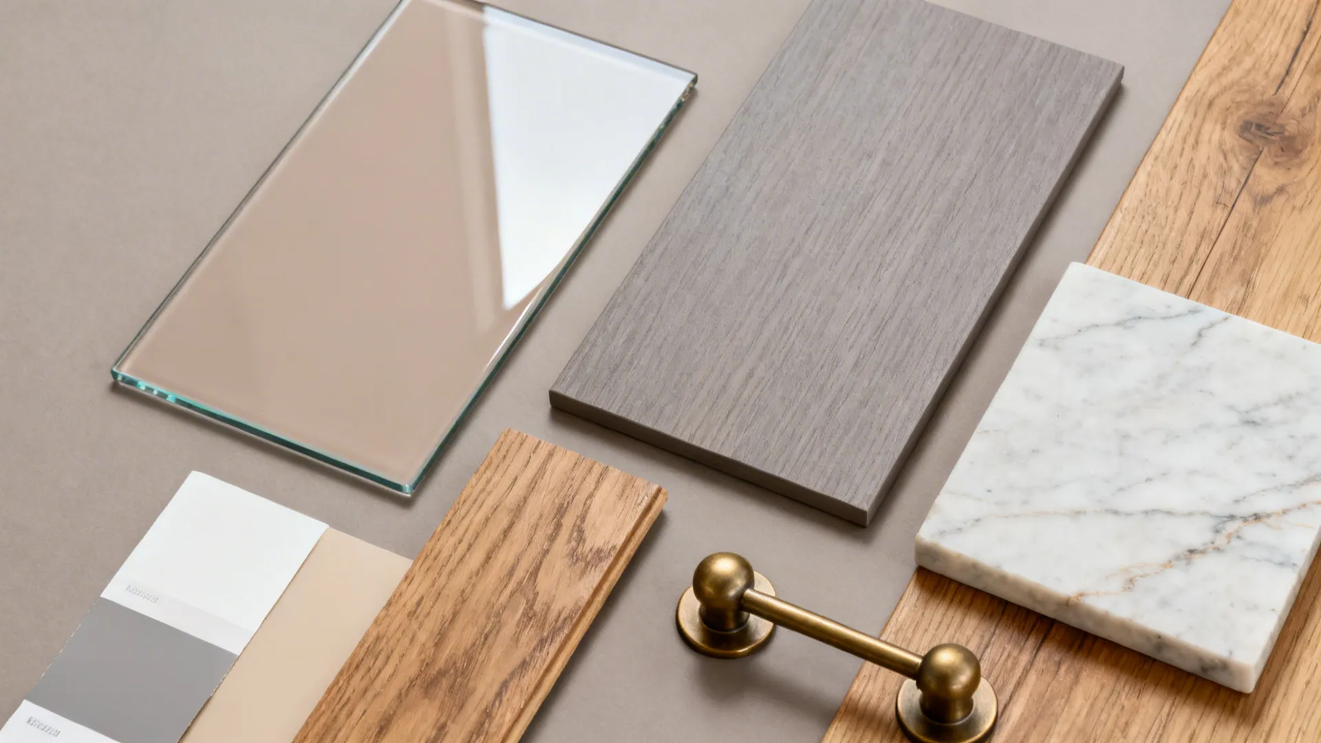 Material board with glass piece wood planks marble tile metal handle and grey color samples