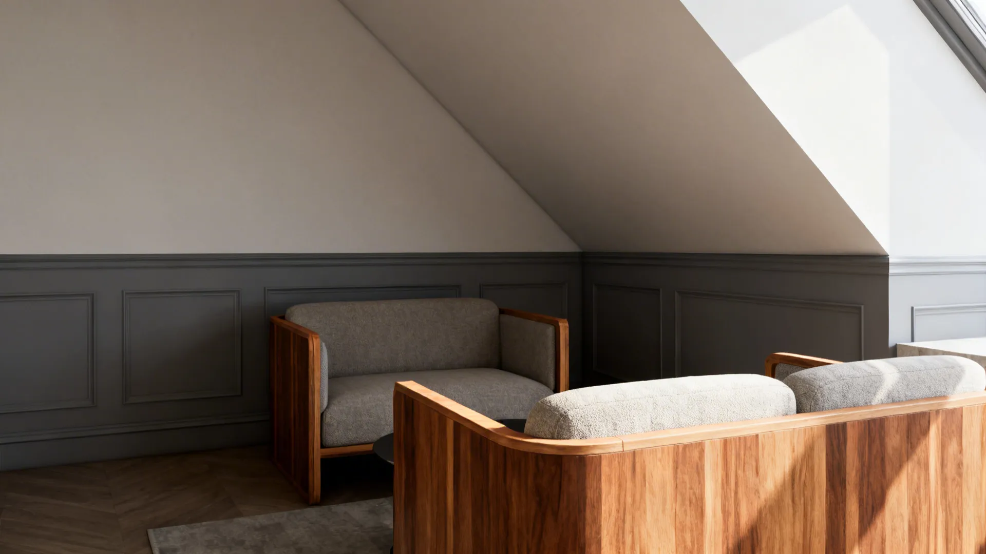 Attic living room with a two-tone gray wall divided by a chair rail and warm wood furnishings.