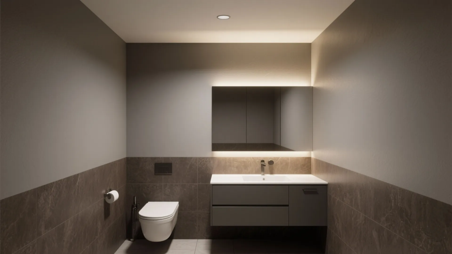 Small bathroom with grey vanity cabinet backlit mirror white toilet and dark grey stone tiles