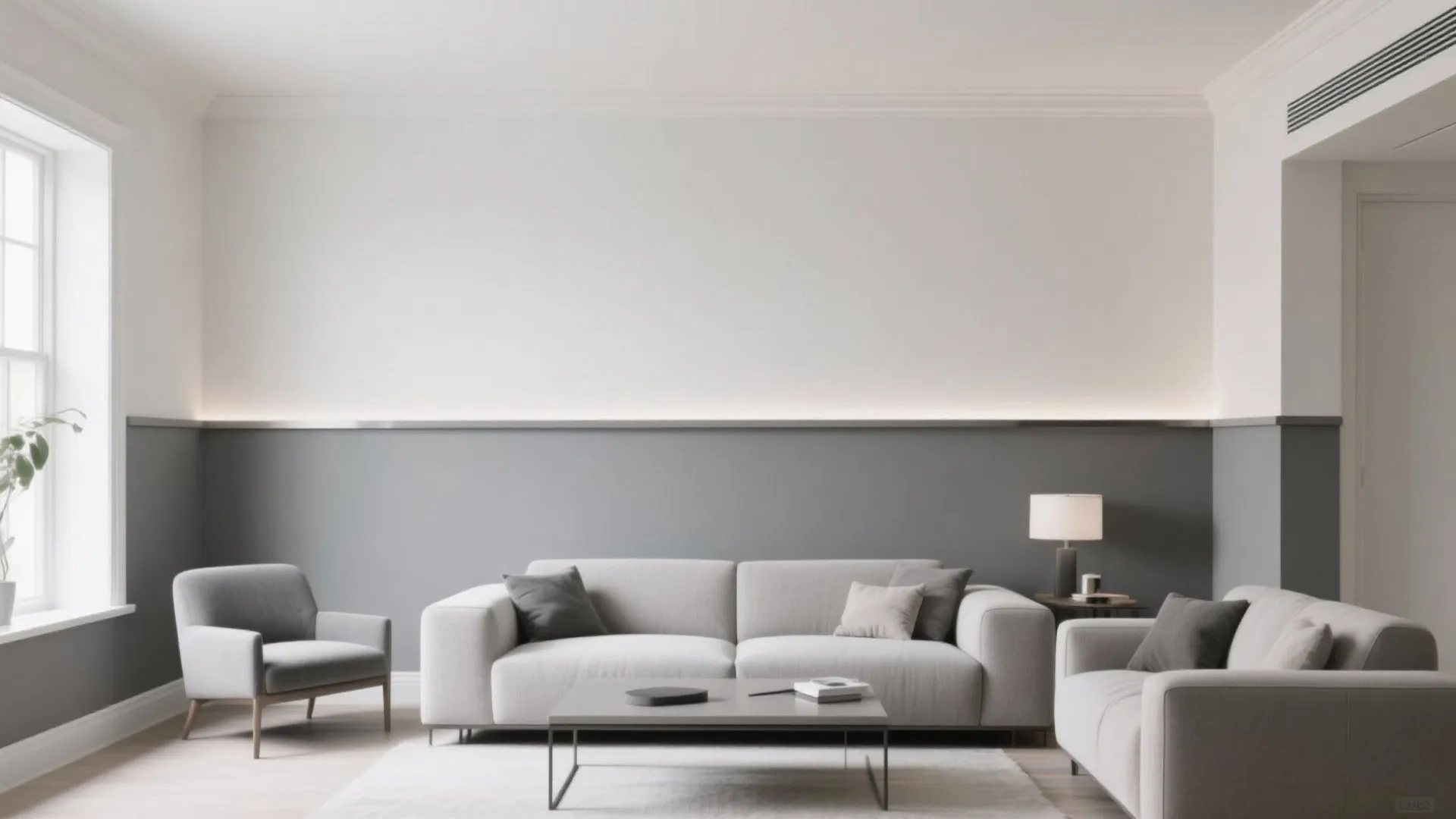 Modern living room featuring grey sofa grey wall panel white walls and soft natural light