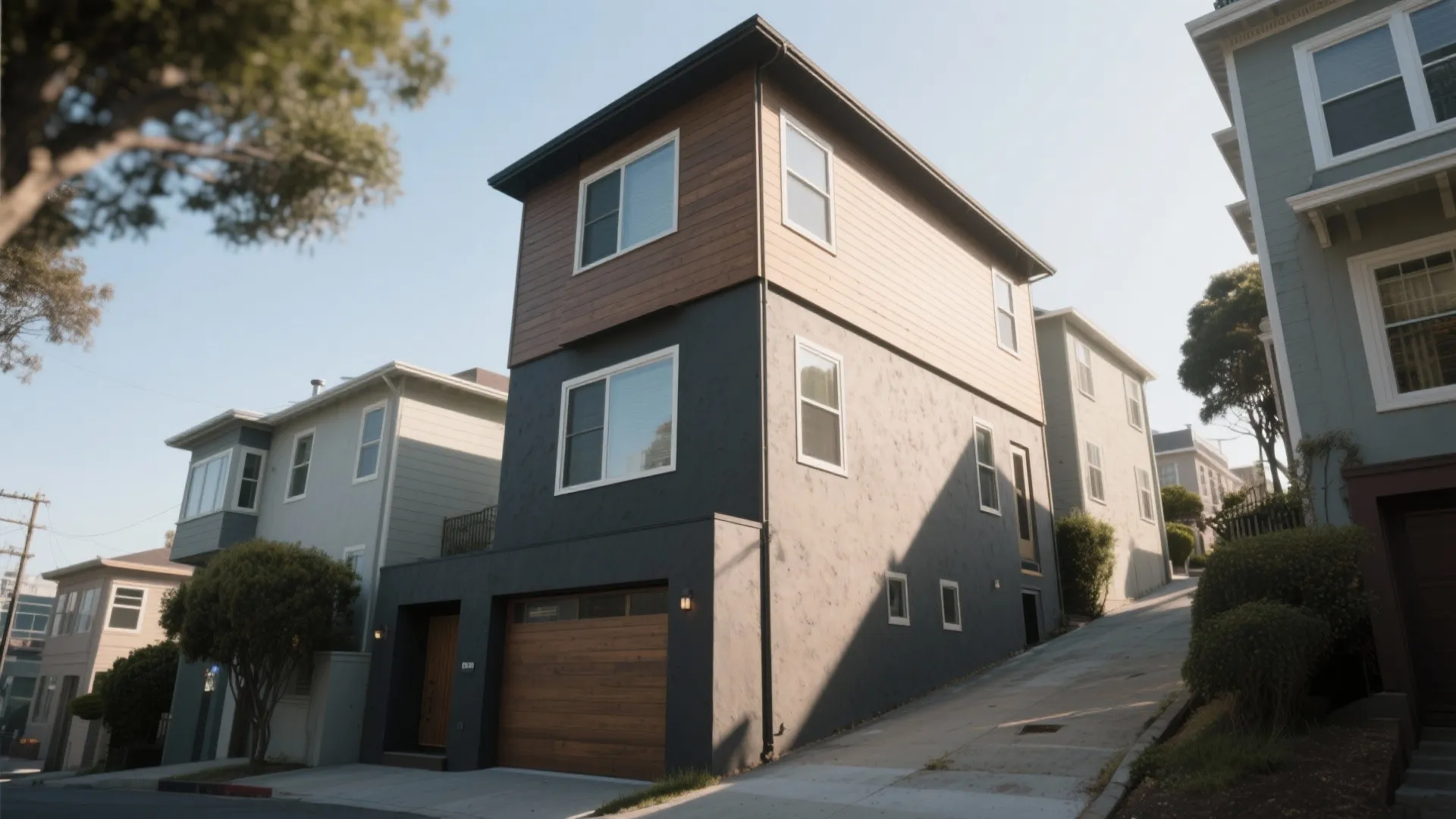 Narrow San Francisco house with a darker lower half and lighter upper levels creating a widened visual effect.