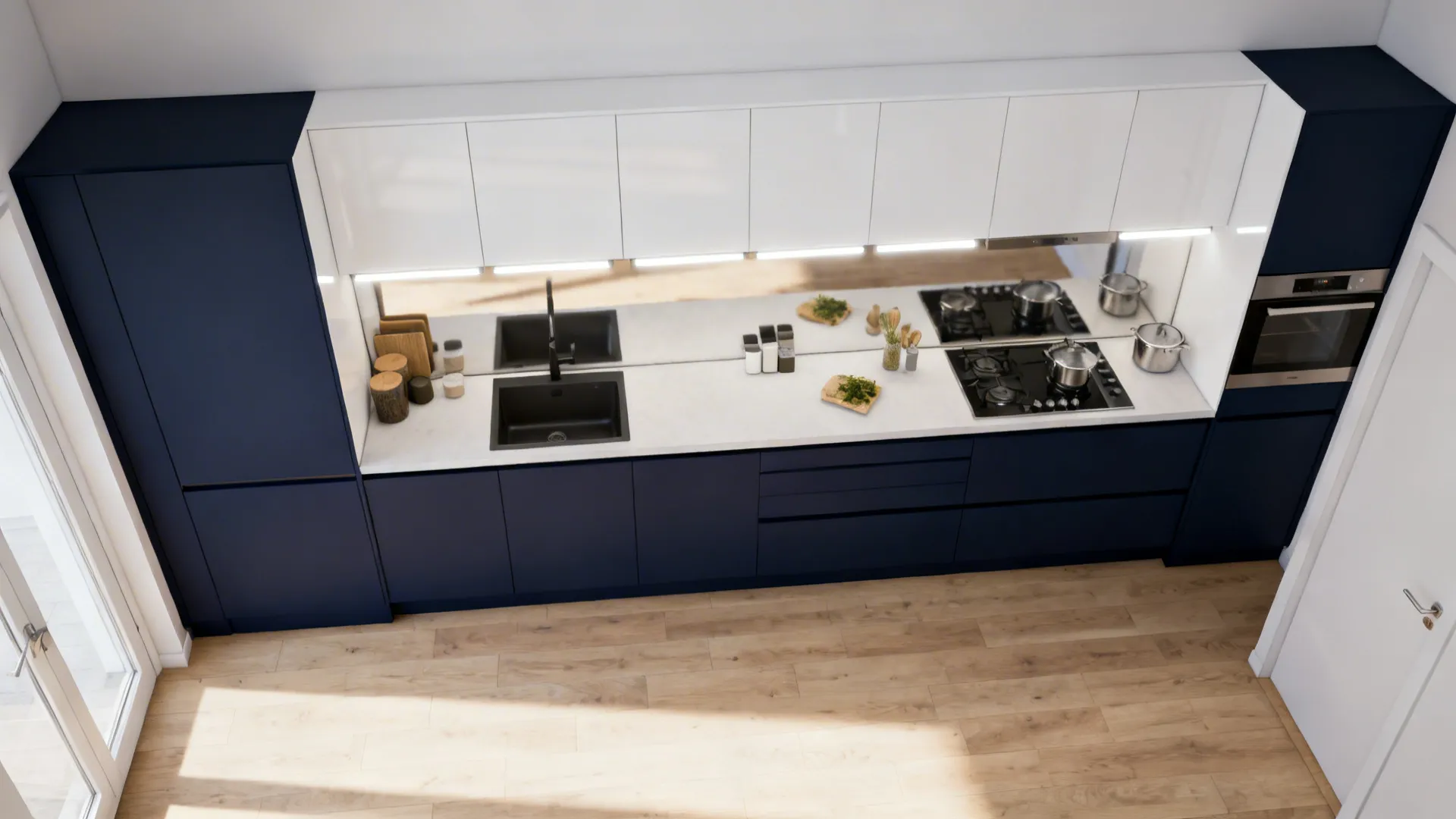 Top-down view of a tiny galley with navy base cabinets, white uppers, and reflective backsplash.
