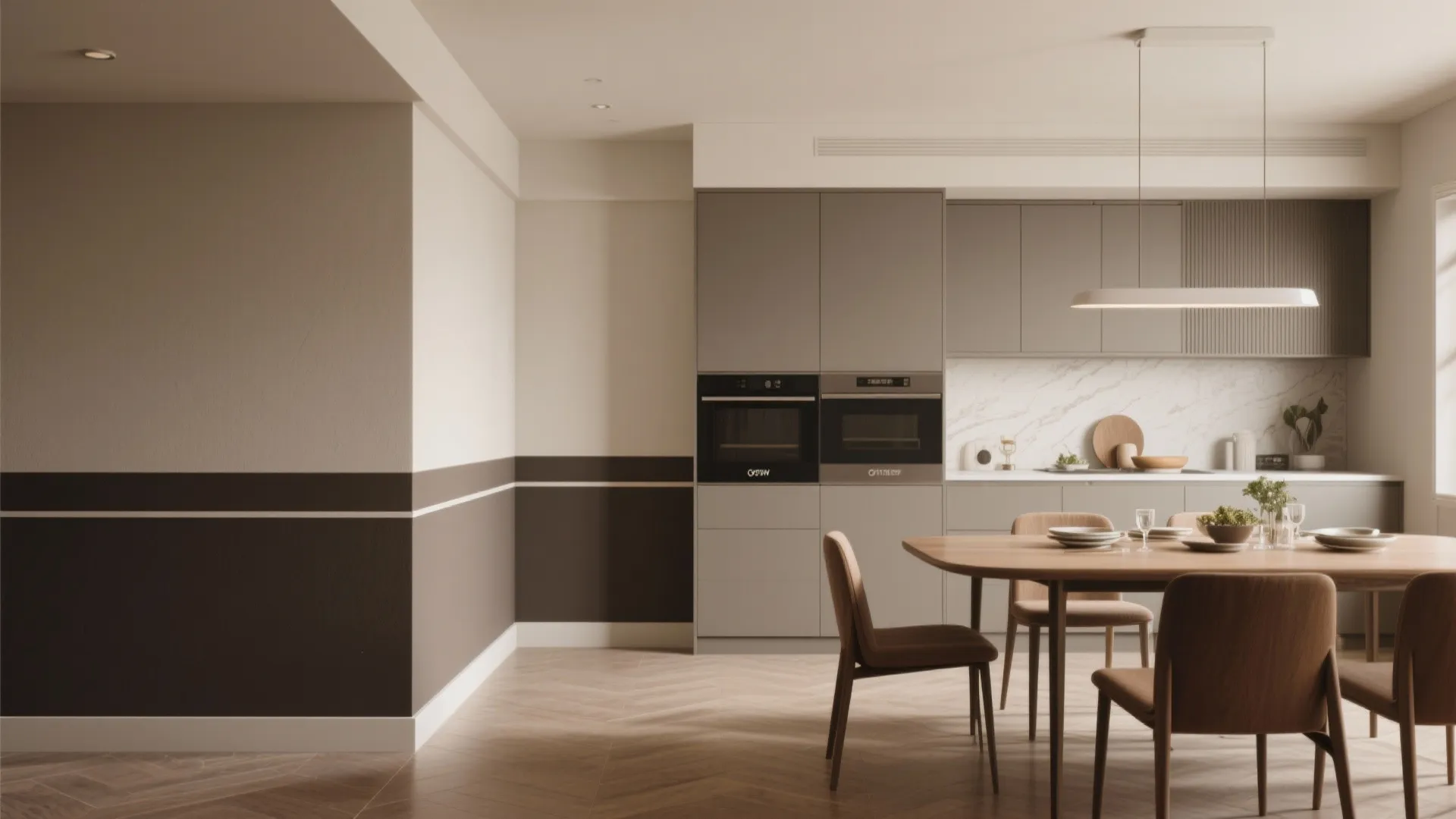 Modern kitchen and dining area with two tone wall paint grey cabinets and wooden table