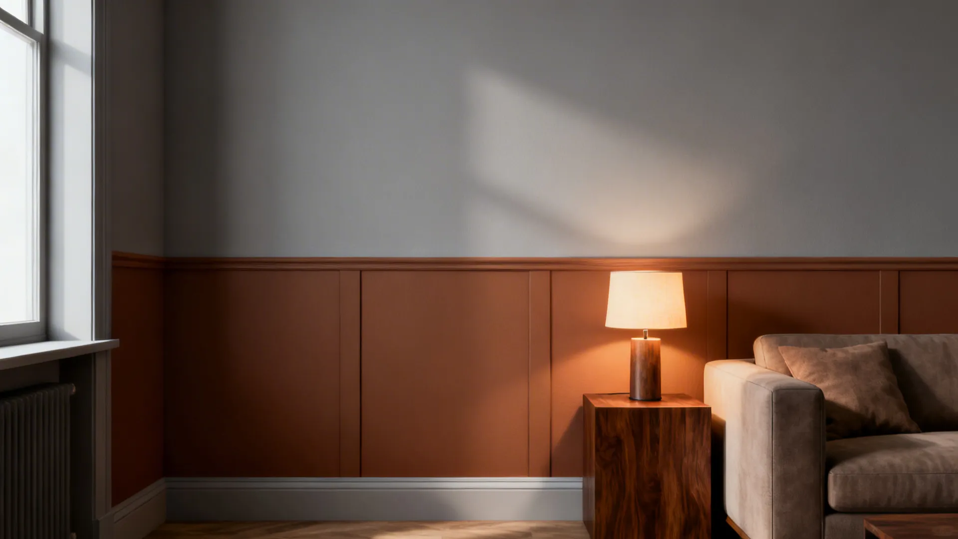 Living room with terracotta wall panel, table lamp on wooden side table, and grey sofa